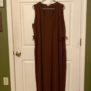 Floor length vest with rivets & braided sides. Very simple